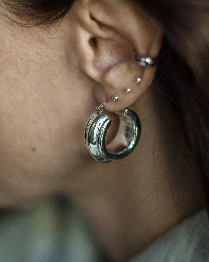 Large, voluminous circle earrings